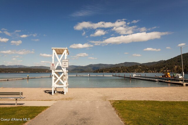 2946 E Point Hayden Dr, Hayden Lake, ID 83835 - water view featuring a mountain backdrop and a dock