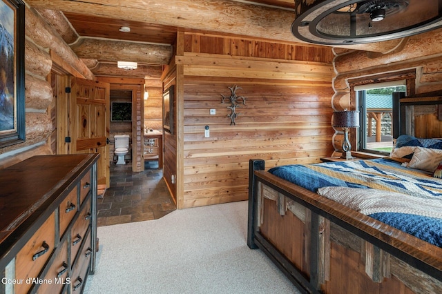 17442 S Painted Rose Rd, Worley, ID 83876 - bedroom featuring log walls and carpet flooring