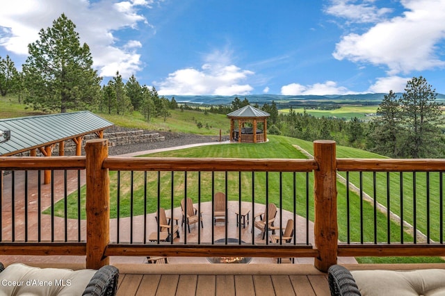 17442 S Painted Rose Rd, Worley, ID 83876 - wooden terrace featuring a gazebo, a lawn, and a mountain view