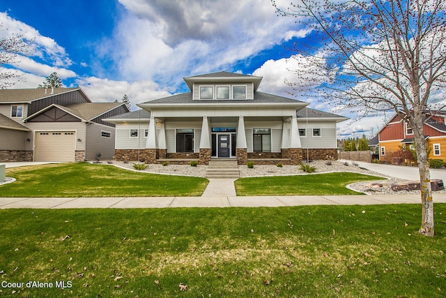 4732 W Mill River Ct, Coeur Dalene, ID 83814 - craftsman-style house featuring stone siding, a front lawn, an attached garage, and a porch
