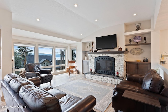 2406 S Silver Beach Rd, Coeur Dalene, ID 83814 - living room with wood finished floors, a fireplace, recessed lighting, lofted ceiling, and built in shelves