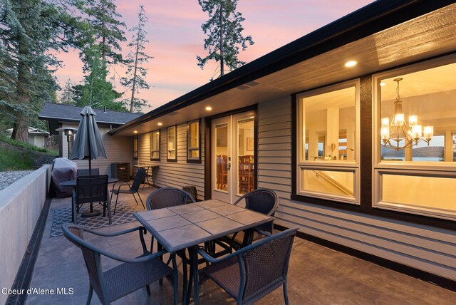 2406 S Silver Beach Rd, Coeur Dalene, ID 83814 - view of patio / terrace featuring outdoor dining space