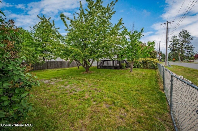 11221 N Crusader St, Hayden, ID 83835 - view of yard with a wooden deck