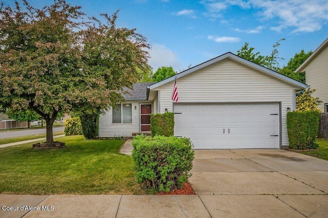 11221 N Crusader St, Hayden, ID 83835 - view of front of property with a front lawn, driveway, and a garage