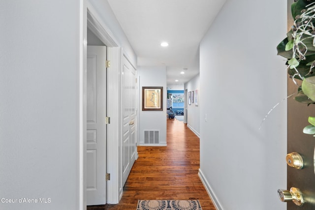 4797 S Arrow Point Dr Unit 104, Harrison, ID 83833 - hallway with wood finished floors, baseboards, and recessed lighting