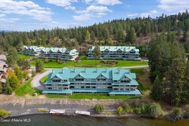 4797 S Arrow Point Dr Unit 104, Harrison, ID 83833 - view from above of property featuring a heavily wooded area and a nearby body of water