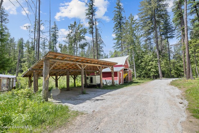 99 Broten Way, Sagle, ID 83860 - view of car parking with driveway and a carport