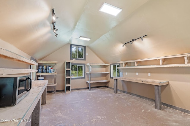 99 Broten Way, Sagle, ID 83860 - bonus room with baseboards, lofted ceiling, and concrete flooring