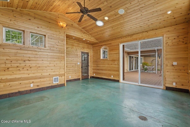 1874 W Polo Green Ave, Post Falls, ID 83854 - empty room featuring wooden ceiling, concrete floors, wood walls, a ceiling fan, and high vaulted ceiling