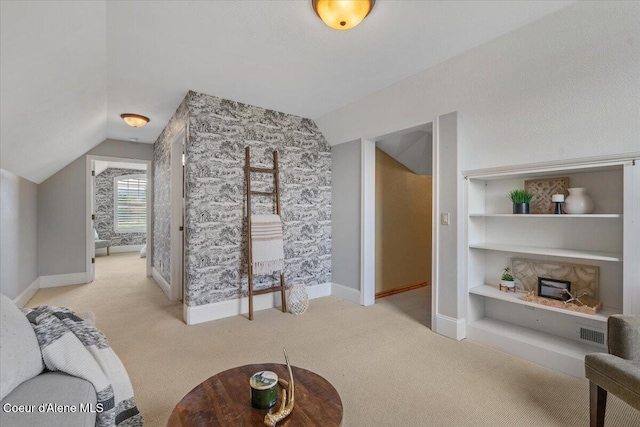 1874 W Polo Green Ave, Post Falls, ID 83854 - carpeted living area with lofted ceiling, built in features, and baseboards