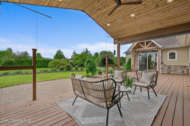1874 W Polo Green Ave, Post Falls, ID 83854 - wooden terrace featuring a yard, a ceiling fan, and outdoor lounge area