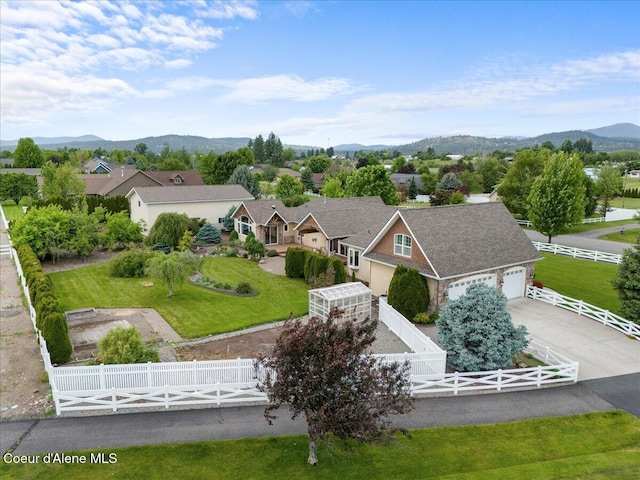 1874 W Polo Green Ave, Post Falls, ID 83854 - aerial view of residential area with a mountain backdrop