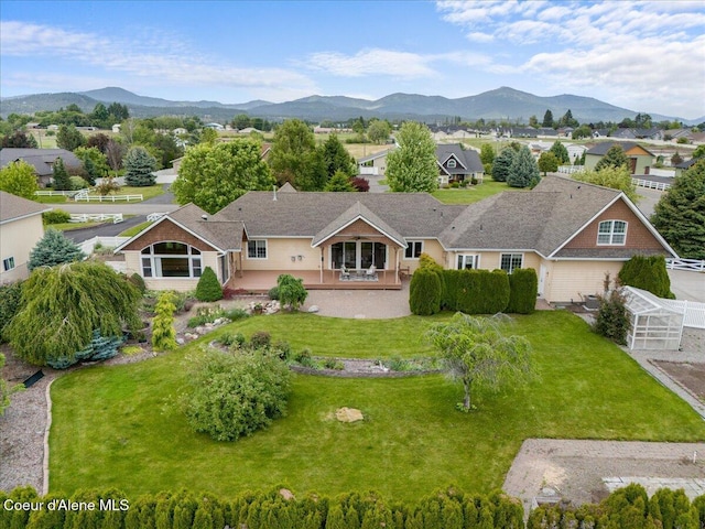 1874 W Polo Green Ave, Post Falls, ID 83854 - aerial view of residential area featuring mountains