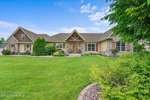 1874 W Polo Green Ave, Post Falls, ID 83854 - view of front of house with stone siding and a front lawn