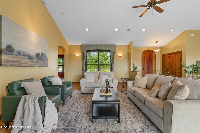 1874 W Polo Green Ave, Post Falls, ID 83854 - living room with arched walkways, lofted ceiling, wood finished floors, a ceiling fan, and recessed lighting