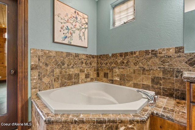 1874 W Polo Green Ave, Post Falls, ID 83854 - full bathroom with a bath and a textured wall