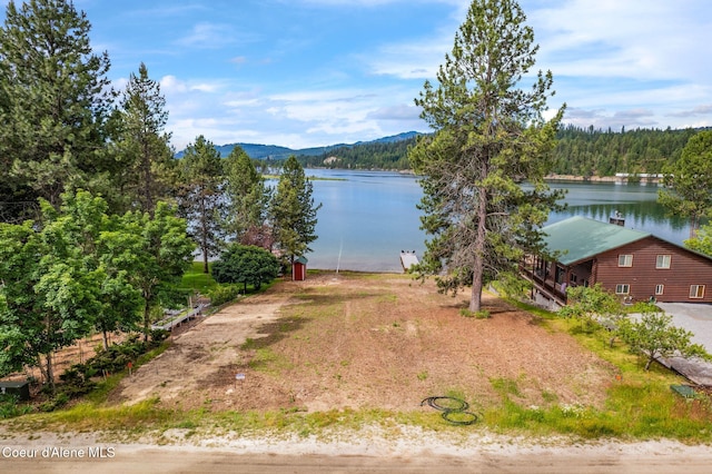 176 Swan Shores Dr, Sagle, ID 83860 - water view with a heavily wooded area and mountains