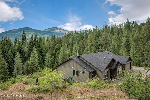 27968 N Timber Ridge Rd, Rathdrum, ID 83858 - view of mountain backdrop with a forest