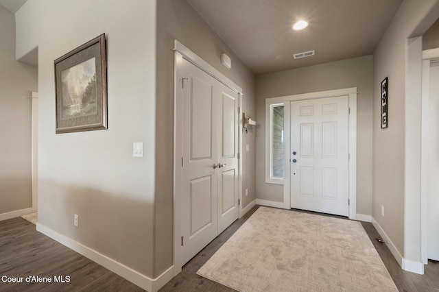27968 N Timber Ridge Rd, Rathdrum, ID 83858 - foyer with baseboards and dark wood-style flooring