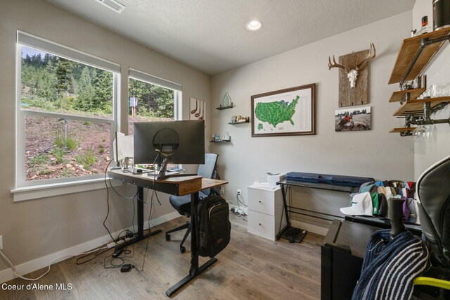27968 N Timber Ridge Rd, Rathdrum, ID 83858 - office space with wood finished floors, baseboards, and recessed lighting