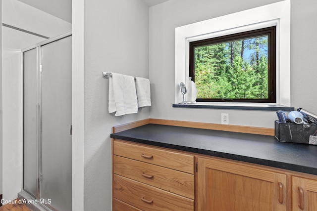 5005 W Cougar Estates Rd, Coeur Dalene, ID 83814 - full bathroom with a stall shower
