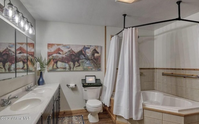19118 St Joe River Rd, Calder, ID 83808 - bathroom with wood finished floors, tiled shower / bath, double vanity, and toilet