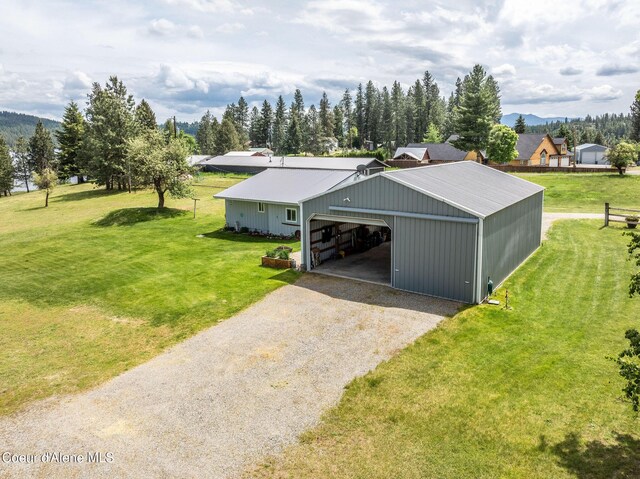 13744 N Hauser Lake Rd, Hauser, ID 83854 - view of outbuilding featuring driveway and a mountain view