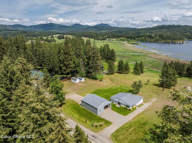 13744 N Hauser Lake Rd, Hauser, ID 83854 - drone / aerial view of a heavily wooded area and a water and mountain view