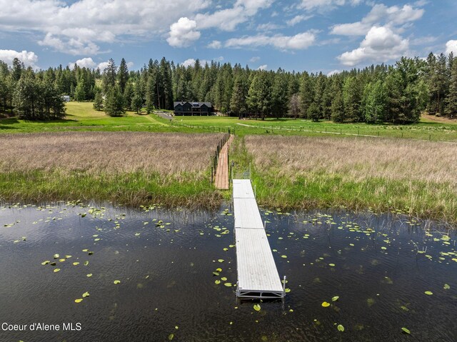 13744 N Hauser Lake Rd, Hauser, ID 83854 - exterior space with a view of trees and a water view