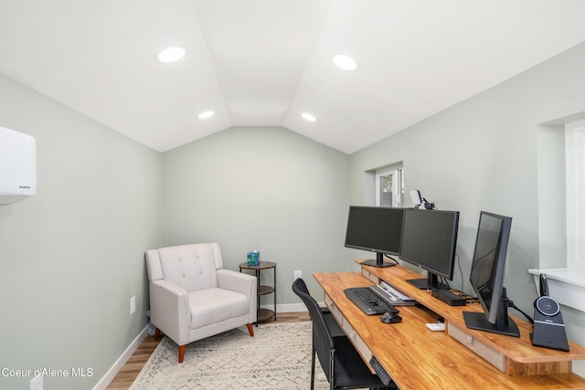 1800 N Willamette Dr, Post Falls, ID 83854 - office featuring light wood-style floors, recessed lighting, lofted ceiling, baseboards, and an AC wall unit