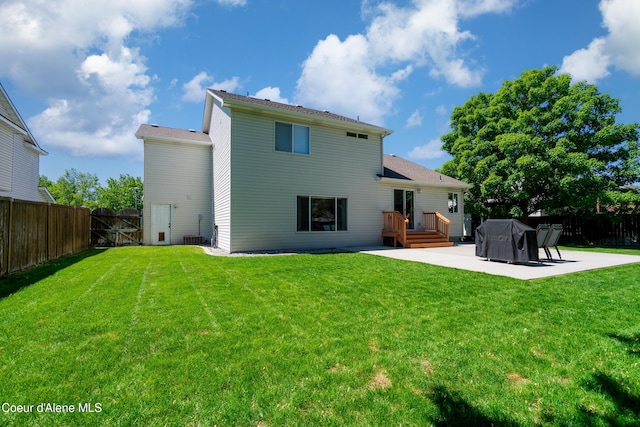1800 N Willamette Dr, Post Falls, ID 83854 - back of house featuring a patio and a gate