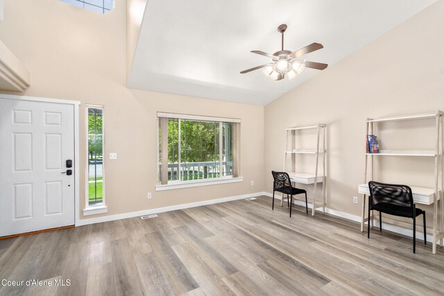 1800 N Willamette Dr, Post Falls, ID 83854 - foyer entrance with ceiling fan, wood finished floors, high vaulted ceiling, and baseboards