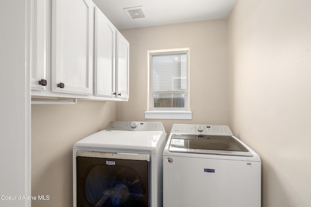 1800 N Willamette Dr, Post Falls, ID 83854 - laundry room with washing machine and clothes dryer and cabinet space