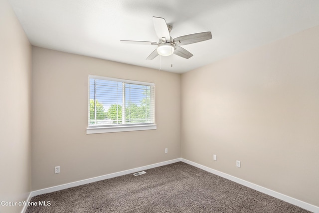 1800 N Willamette Dr, Post Falls, ID 83854 - unfurnished room featuring baseboards, carpet floors, and a ceiling fan