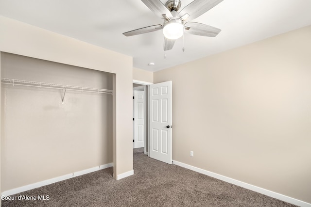 1800 N Willamette Dr, Post Falls, ID 83854 - unfurnished bedroom featuring dark colored carpet, a closet, baseboards, and ceiling fan