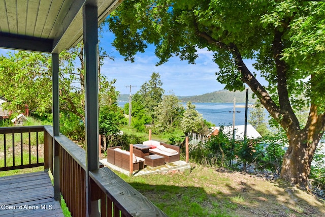 108 E Lincoln Ct, Harrison, ID 83833 - wooden deck with a water view and an outdoor hangout area