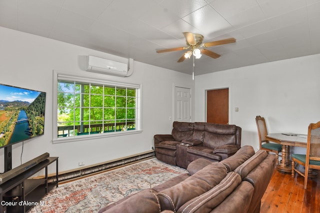 108 E Lincoln Ct, Harrison, ID 83833 - living room with a wall unit AC, hardwood / wood-style floors, and ceiling fan