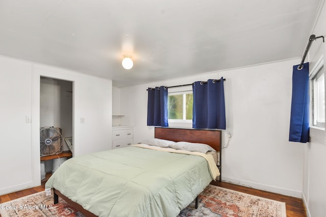 108 E Lincoln Ct, Harrison, ID 83833 - bedroom with wood finished floors and baseboards