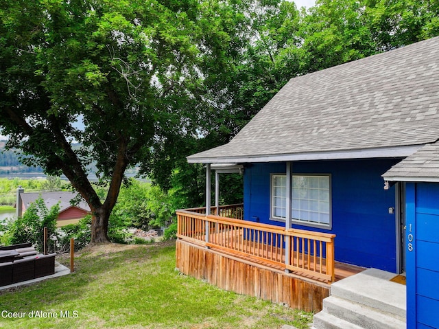 108 E Lincoln Ct, Harrison, ID 83833 - view of grassy yard with a wooden deck