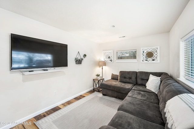 924 N 6th St, Coeur Dalene, ID 83814 - living area featuring baseboards and wood finished floors