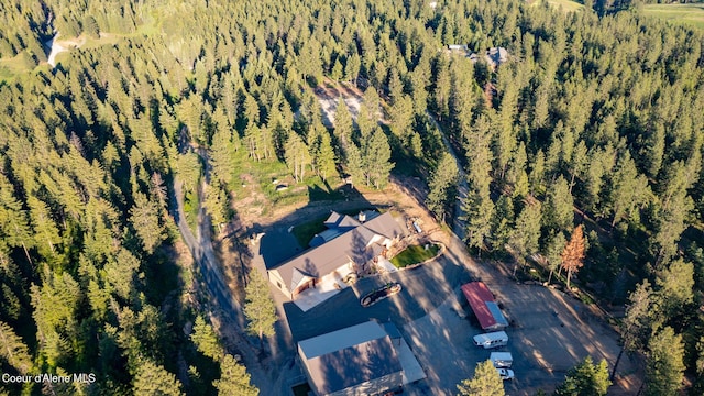 9057 W Benton Way, Coeur Dalene, ID 83814 - aerial overview of property's location with a forest