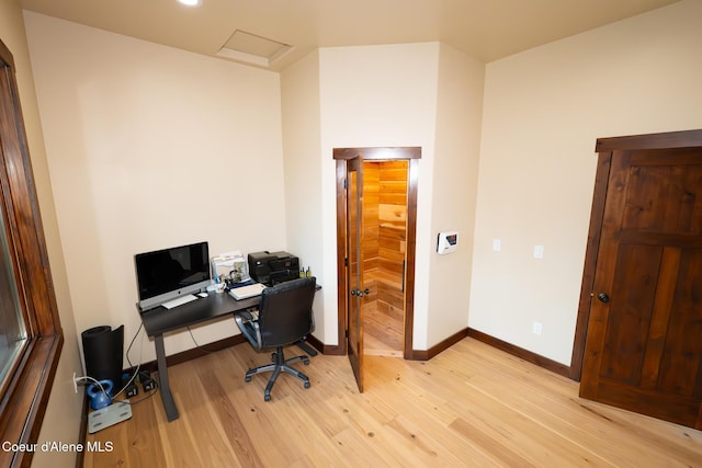 9057 W Benton Way, Coeur Dalene, ID 83814 - office space featuring light wood finished floors, baseboards, and attic access