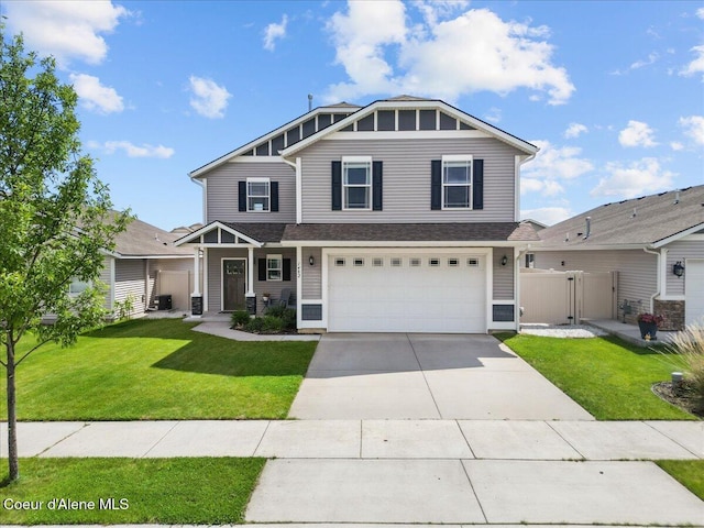 1482 N Skykomish Dr, Post Falls, ID 83854 - craftsman-style home featuring an attached garage, driveway, and a gate