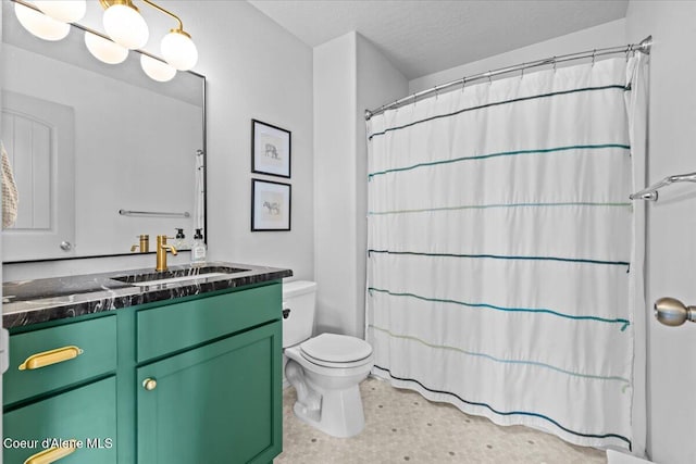 1482 N Skykomish Dr, Post Falls, ID 83854 - full bath with toilet, vanity, a shower with curtain, and a textured ceiling