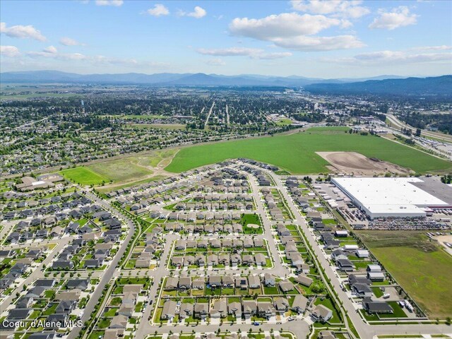 1482 N Skykomish Dr, Post Falls, ID 83854 - aerial view of residential area featuring a mountainous background