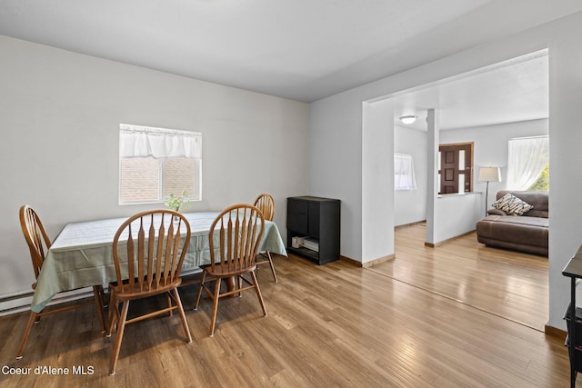 5739 W Maine St, Spirit Lake, ID 83869 - dining room with wood finished floors