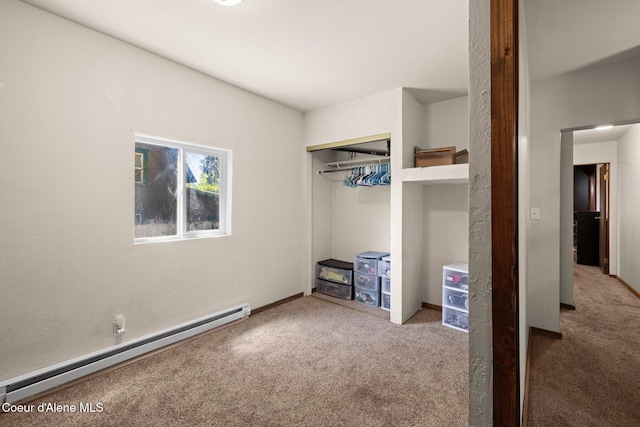 5739 W Maine St, Spirit Lake, ID 83869 - unfurnished bedroom with a baseboard radiator, carpet flooring, a closet, and baseboards
