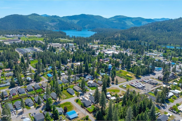 5739 W Maine St, Spirit Lake, ID 83869 - aerial view of property's location featuring a heavily wooded area and a water and mountain view