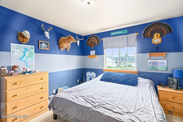 8558 N Boysenberry Loop, Hayden, ID 83835 - bedroom featuring carpet and a textured ceiling