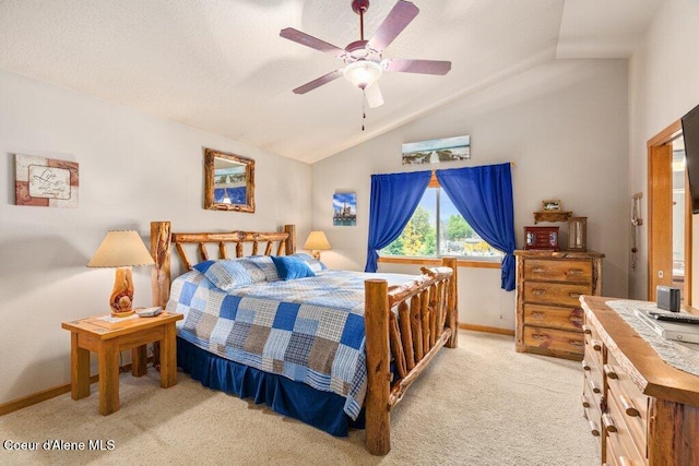8558 N Boysenberry Loop, Hayden, ID 83835 - bedroom with vaulted ceiling, carpet floors, baseboards, and ceiling fan